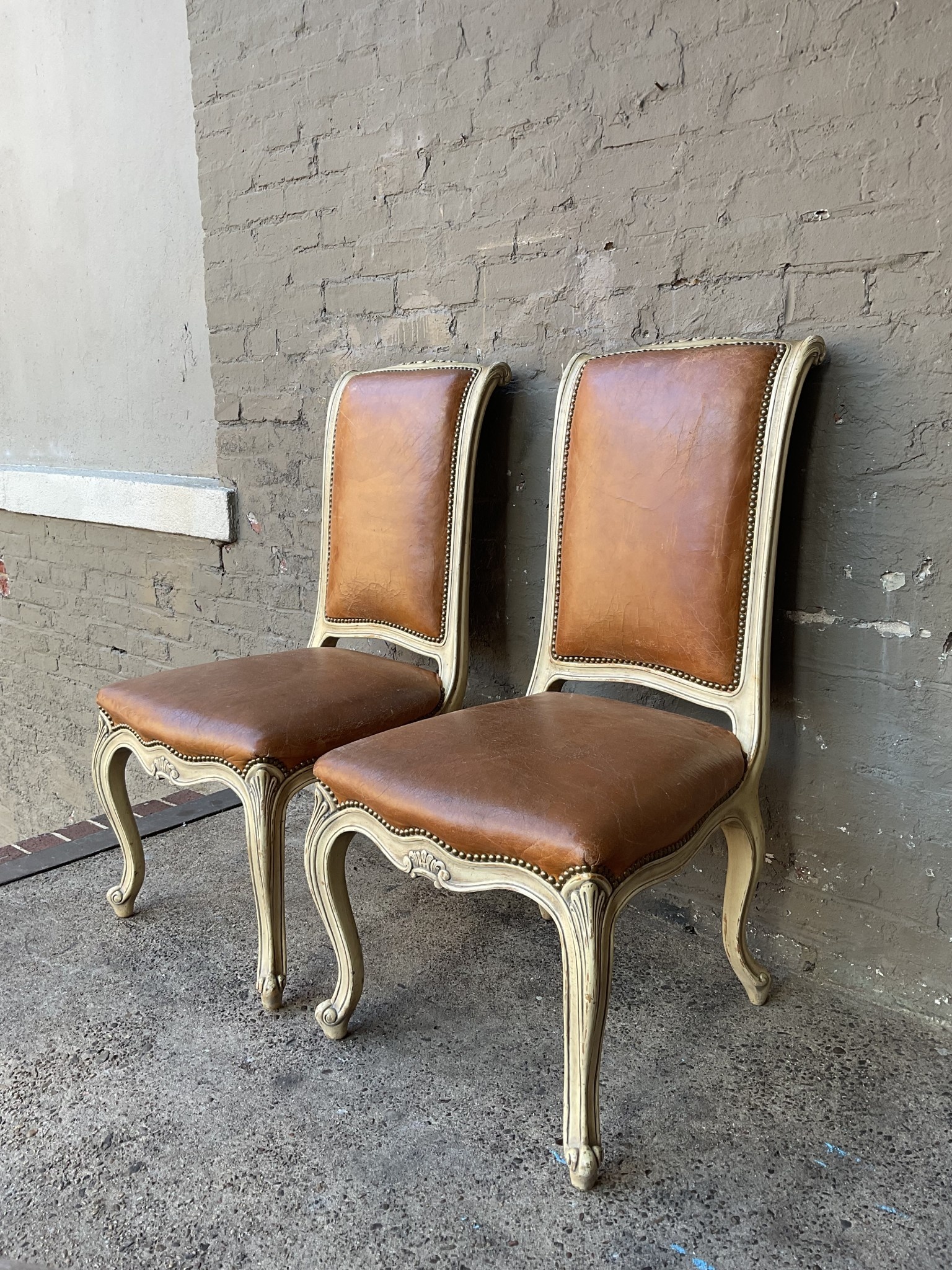 Pair of French Provencial Leather Side Chairs